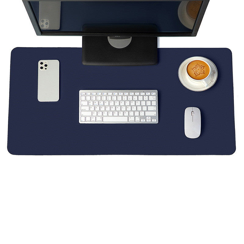Dark blue desk mat and mouse pad set, perfect for adding a bold, clean look to your desk setup.