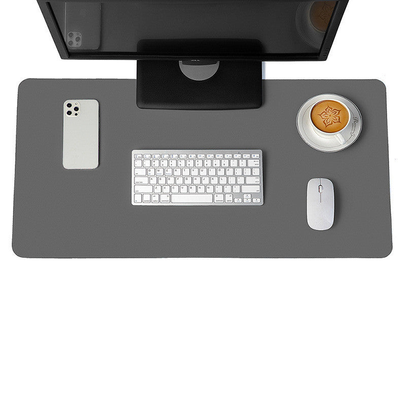 Dark grey desk mat and mouse pad set, a sleek and modern addition to any professional or home workspace.