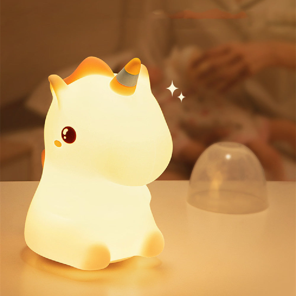 LED unicorn night light softly glowing on a nursery table, ideal for comforting babies or toddlers during bedtime.