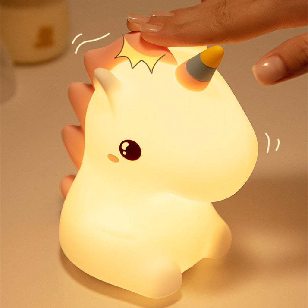 Touch-activated LED unicorn night light with soft silicone design, perfect for kids' bedrooms or nursery night-time comfort.