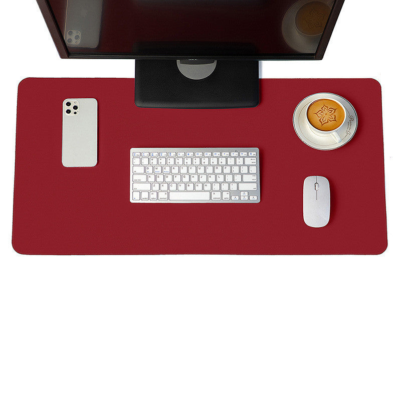 Red desk mat and mouse pad set, a vibrant choice to brighten up any home or office workspace.