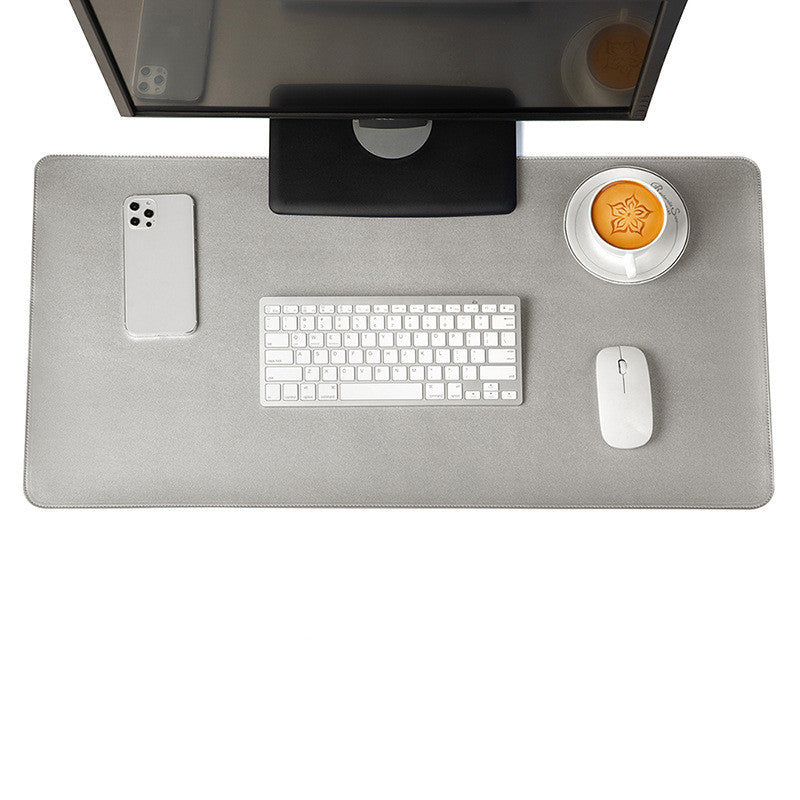 Silver desk mat and mouse pad set, a sleek and stylish option for a modern, professional workspace.